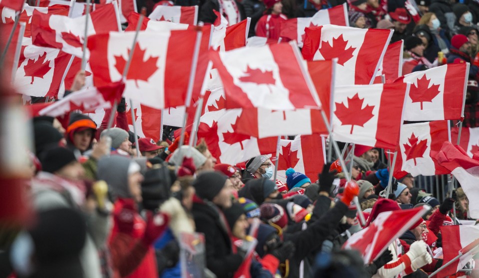 Fans inside the BMO Field celebrate Canada's epic qualification