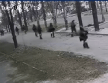 Russian soldiers march through Kherson before the city fell to Putin