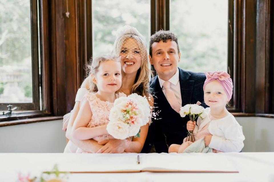 Laura and Rhys got married in May 2021, after being together for 15 years. They are pictured with their girls, Mollie (left), five, and Megan (right), two