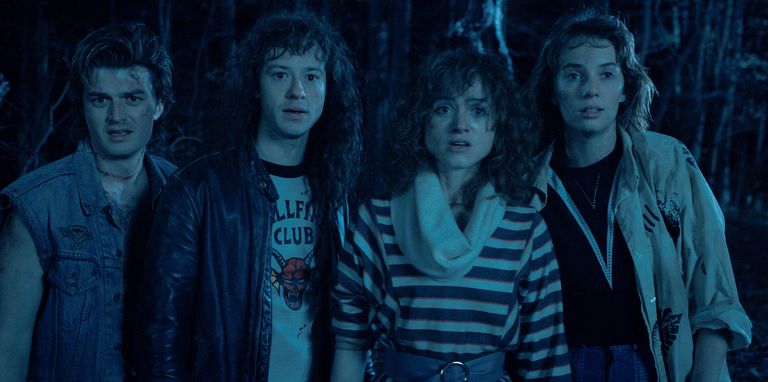 Joseph Quinn, second left, looks completely unrecognisable in his new Stranger Things role