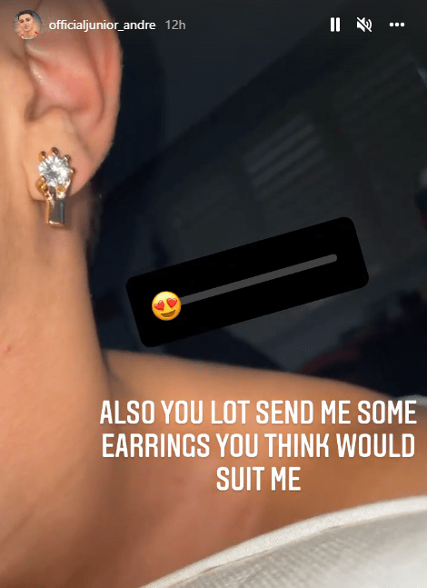 The teenager showed off his interesting style with the gold earrings of a hand grabbing a diamond