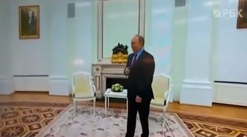 In a video clip, Putin seems to have difficulty walking