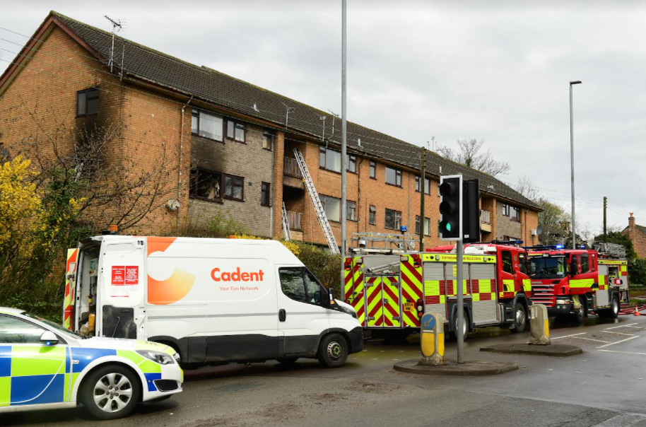 A woman in her 40s has died following a fire at a low-rise block of flats in Stoke