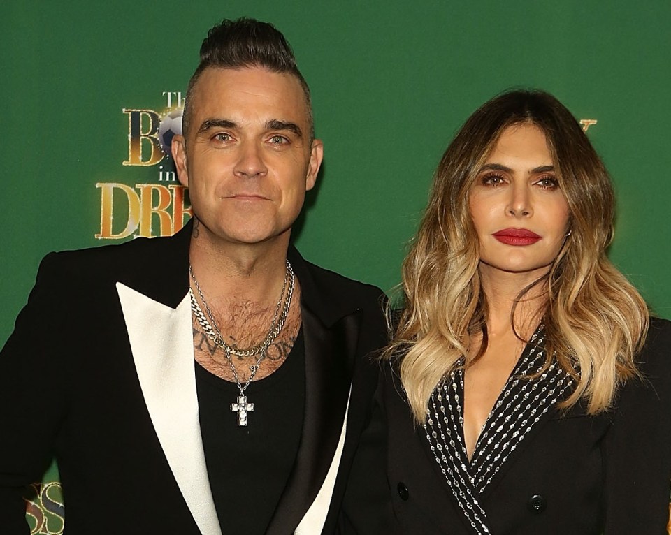 Robbie, here with his wife Ayda Field, are returning to London with their children