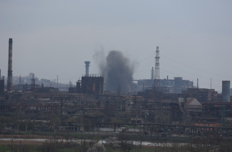 Up to 20 Brit fighters were trapped in bunkers pounded by Russian airstrikes in Mariupol - pictured the Azovstal steelworks plant