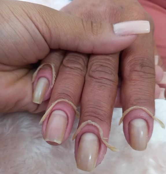 A nail tech has shared a look at her latest manicure, but shocked TikTok viewers with her cuticles removal