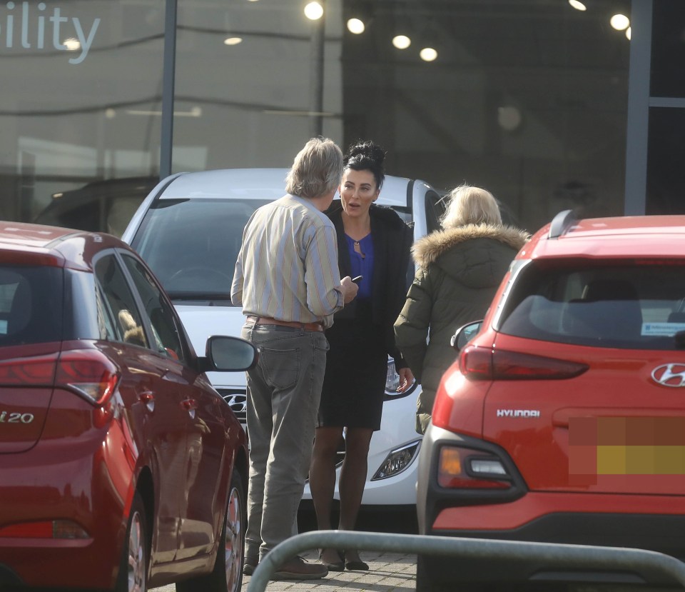 Gabriela is pictured at work on a car dealership lot in York after quitting fame