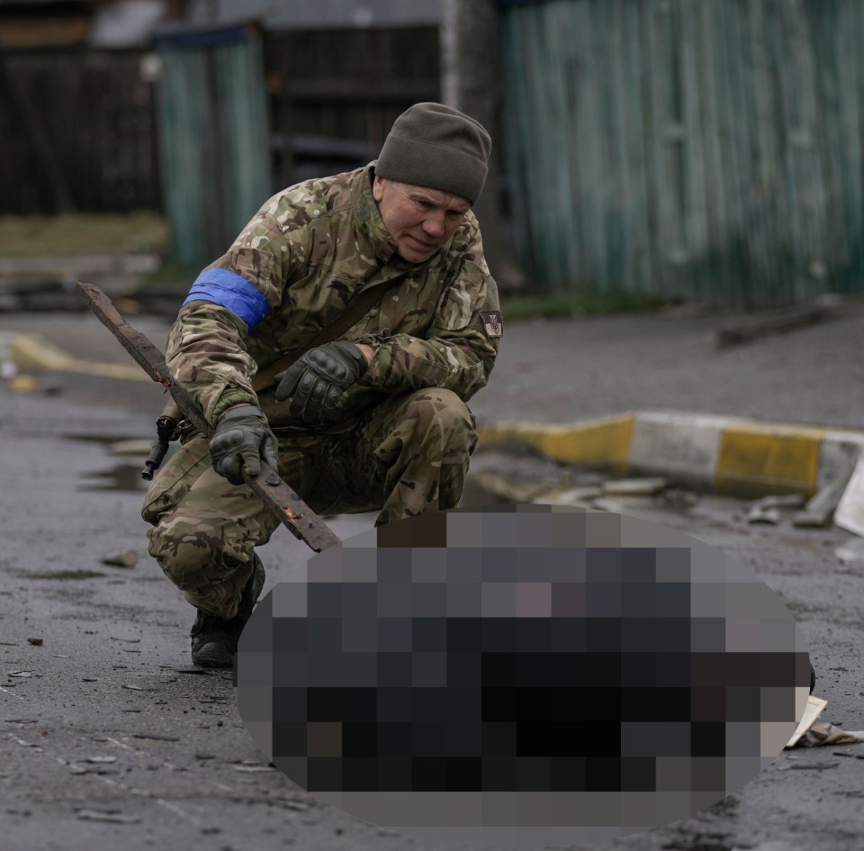 Russian troops have been accused of planting explosives under dead bodies