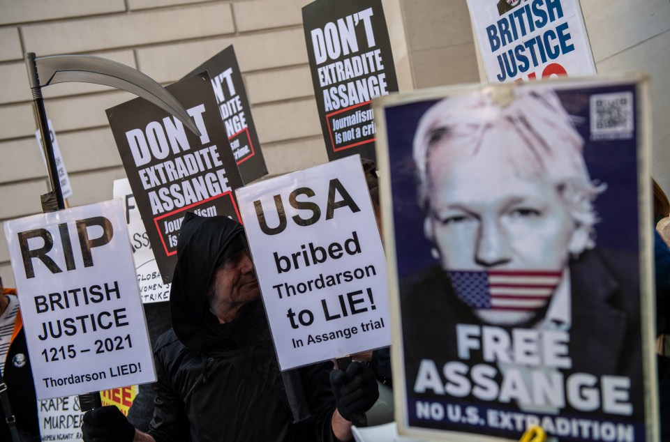 Supporters of Assange protest outside court before the hearing on Wednesday