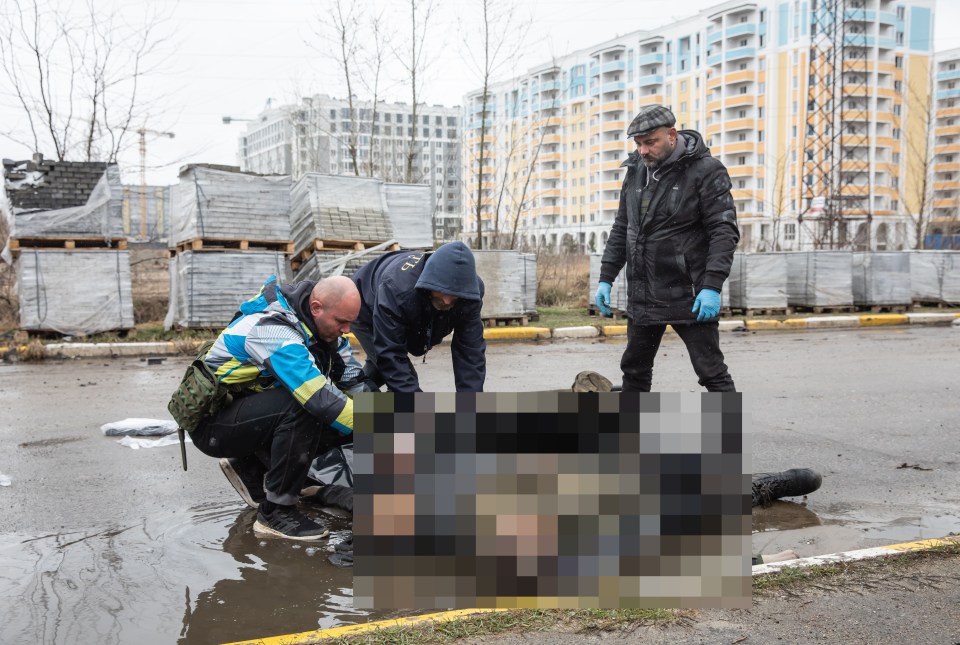 Rescuers retrieve mutilated corpses from the apocalyptic streets of Bucha