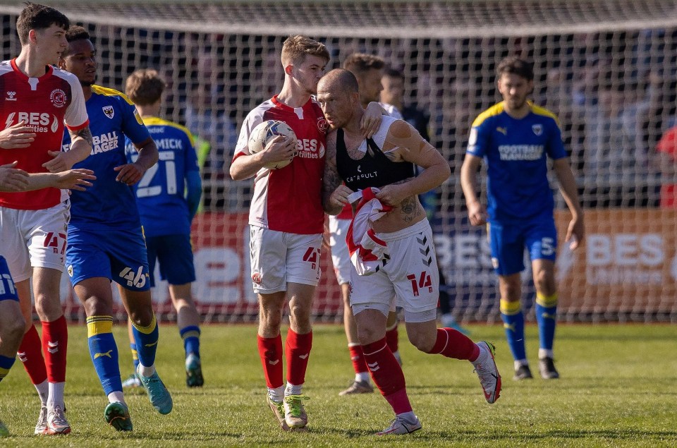 Joe Garner buried the free-kick in the 88th minute to send AFC Wimbledon back to League Two