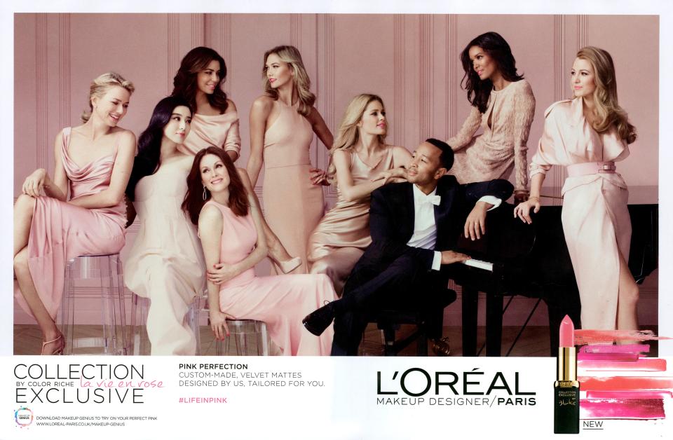 Musician John Legend poses with Hollywood actresses for French beauty brand L'Oreal