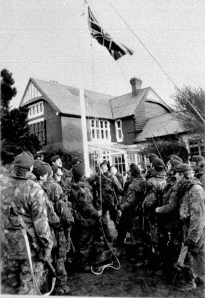 Pete Holdgate’s photo of NP8901 raising the Falklands flag at Government House after the Argentine surrender