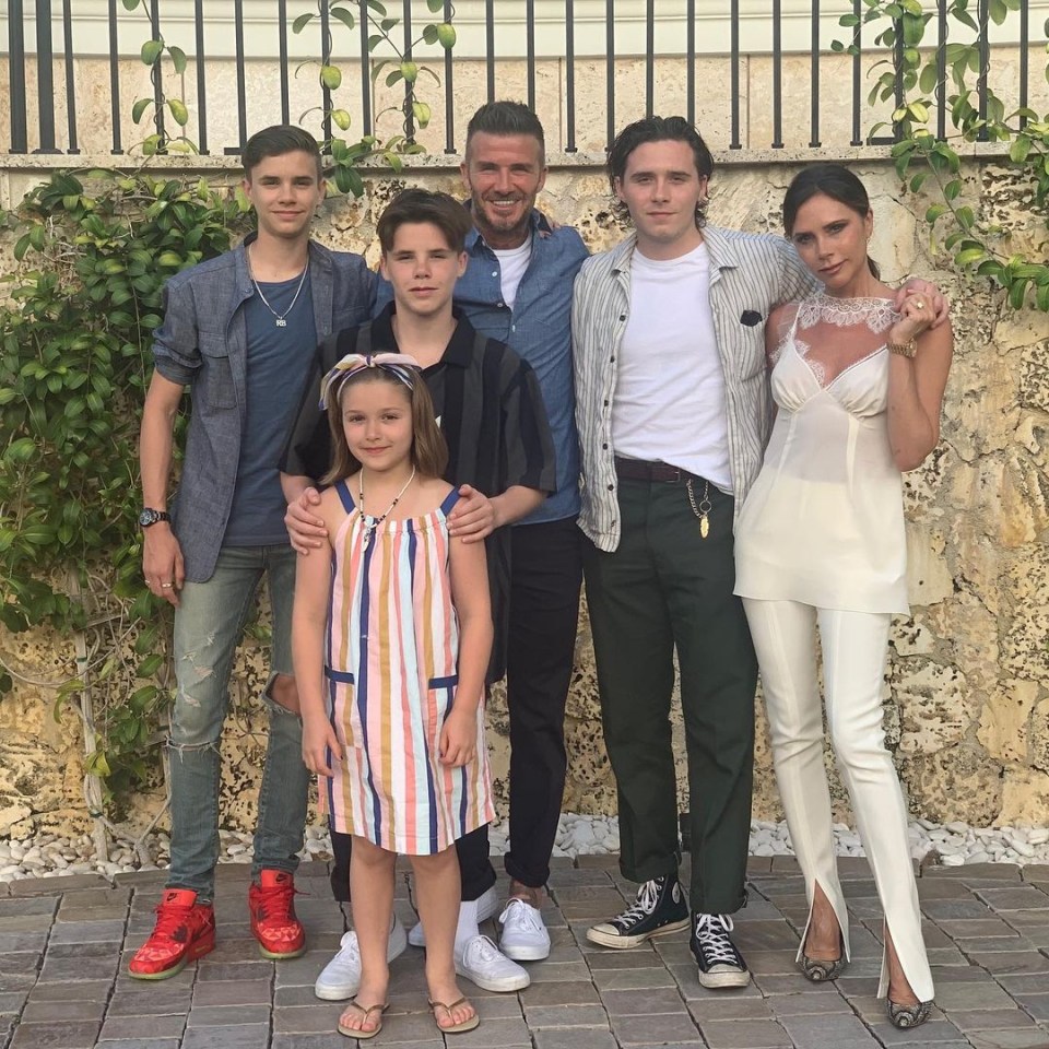 Harper pictured with her mum Victoria, dad David, and older brothers Brooklyn, Romeo and Cruz