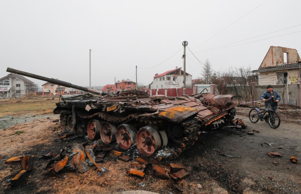 A destroyed Russian tank after Ukrainian fighters reclaimed the village of Dmitrivka near Kyiv