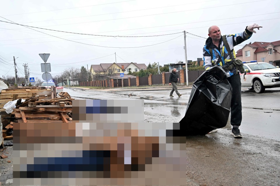 A dead civilian is found lying in the road with his hands tied behind his back