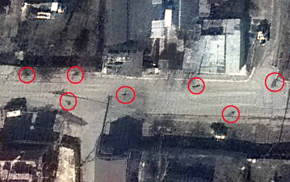 Another image taken on March 19 shows several bodies, believed to be the victims of Russian troops, on the same stretch of road