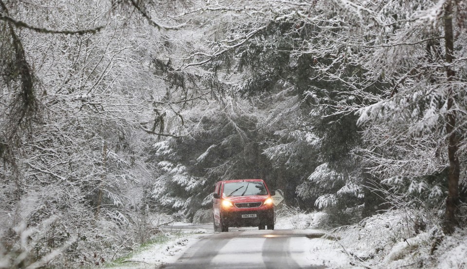 A car tackles an icy road near Inverness