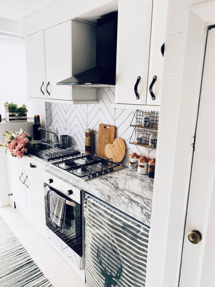 The mum used a variety of different vinyl sheets to create a modern kitchen space