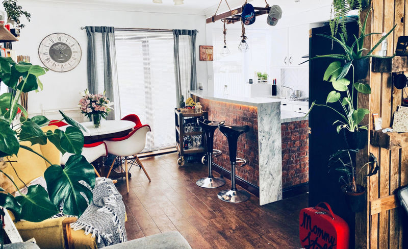 The mum totally transformed her drab kitchen, create an exposed brick bar using vinyl