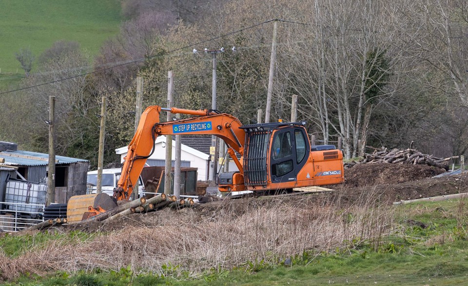 A digger and other building material on land owned by Mr Rees