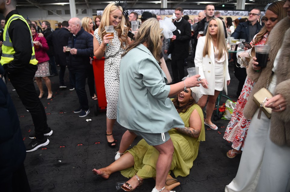 Revellers returned to Aintree Racecourse for the Grand National today - and there were some very high spirits