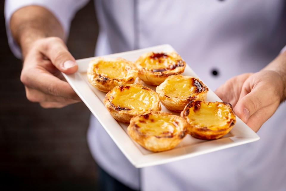 You must try the famous pastel de nata — pastry tarts filled with eggy custard