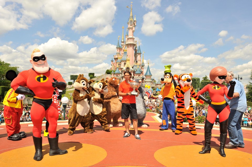 Rafael Nadal celebrating his Roland Garros Trophy for the second time at Disneyland Paris