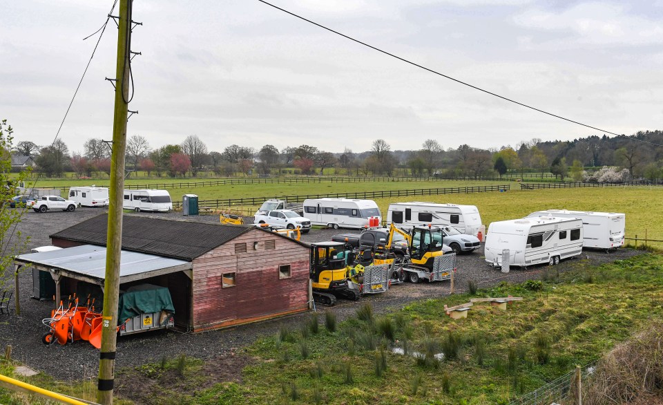 A group of travellers who parked up on a site close to mansions owned by Wayne and Coleen Rooney and Marcus Rashford have been given 12 months to leave