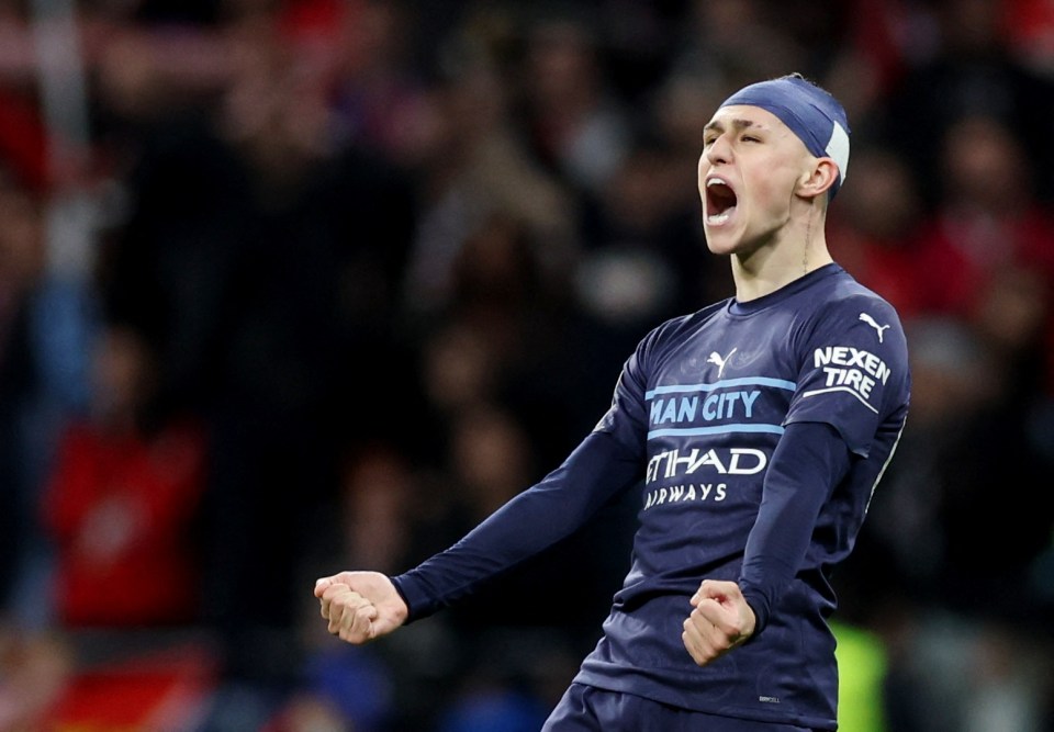 Phil Foden celebrates Man City's hard-fought victory after the full time whistle