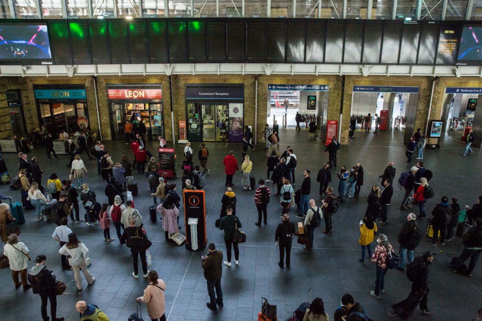 King's Cross is getting busier as travellers with bags on their shoulders try to head away from the capital