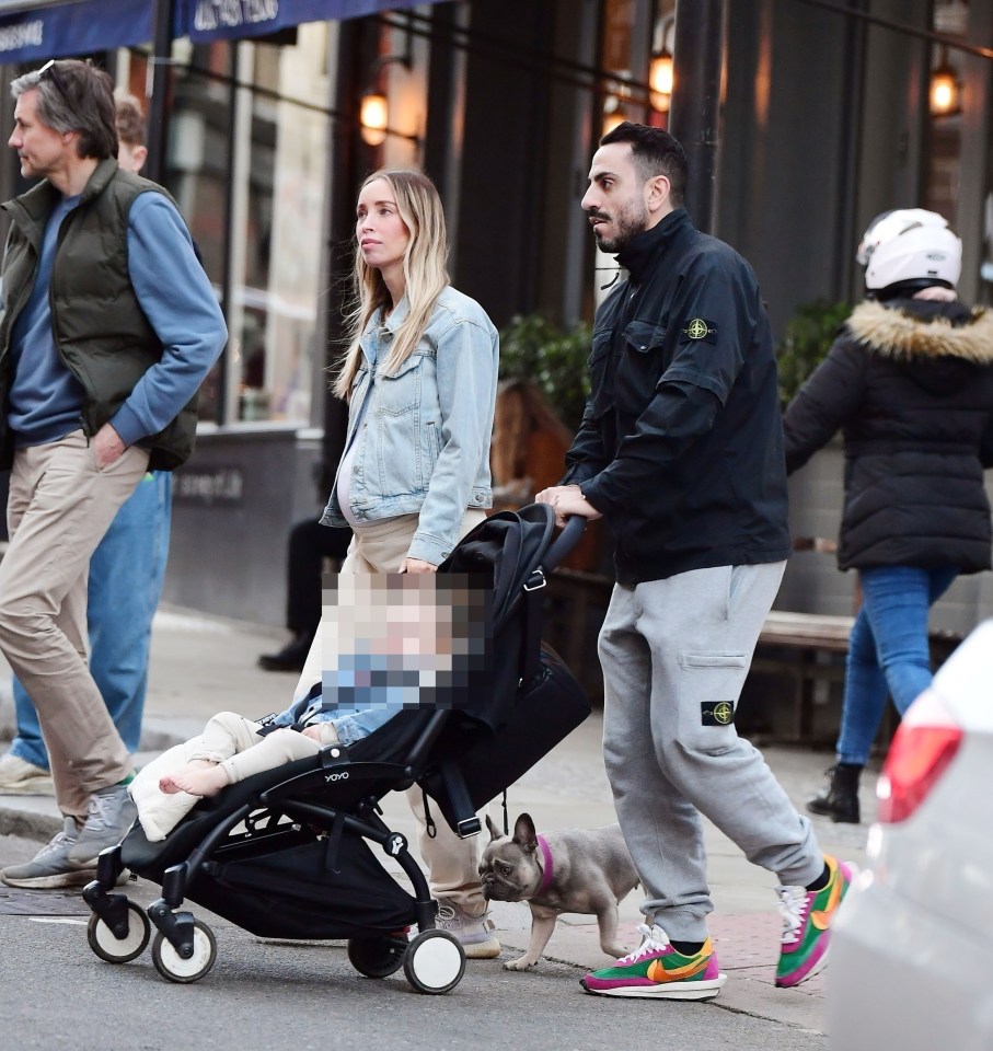 The TV star was spotted on the family stroll in London's Hampstead