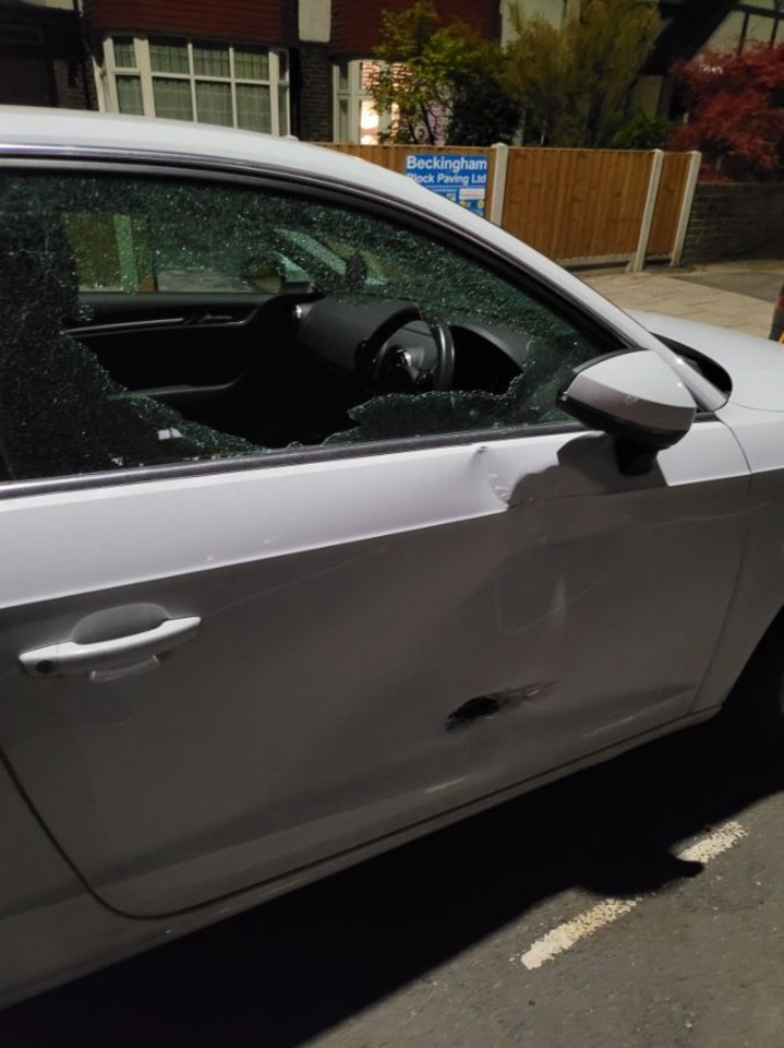 The drivers' side door and window was battered