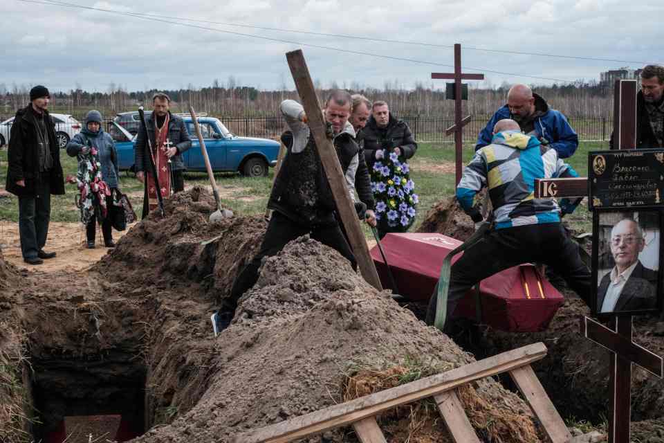 Workers have been digging plots and erecting crucifixes on the site