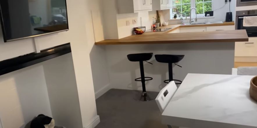 The kitchen looks out onto the dining area