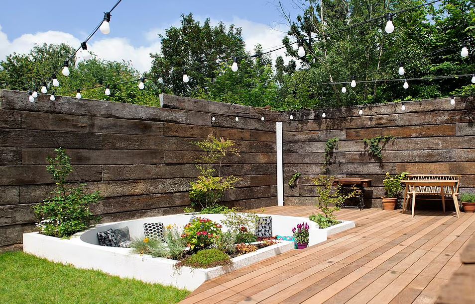 The plentiful space enabled the couple to add decking and a fire pit