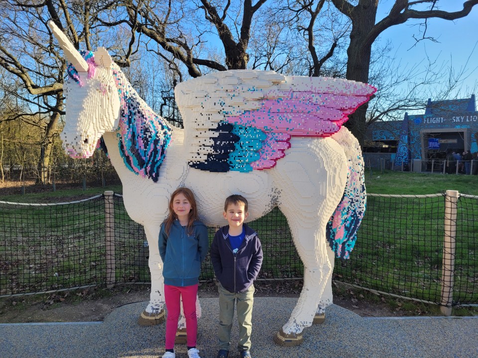 Poppy and Lucas with a Lego unicorn