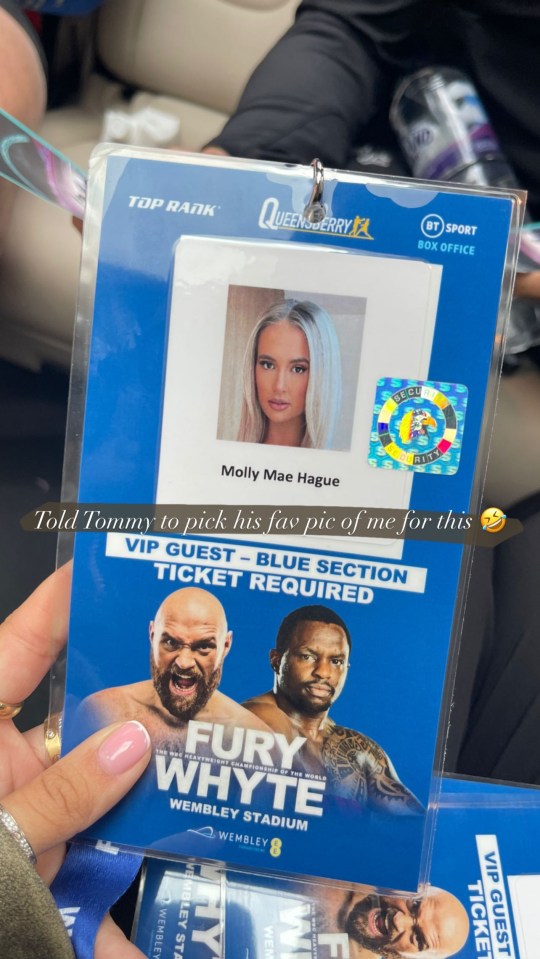 Molly-Mae showed off her ringside VIP pass which Tommy picked the picture for