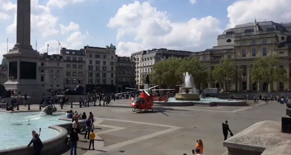 Witnesses were shocked to see the air ambulance at the London landmark