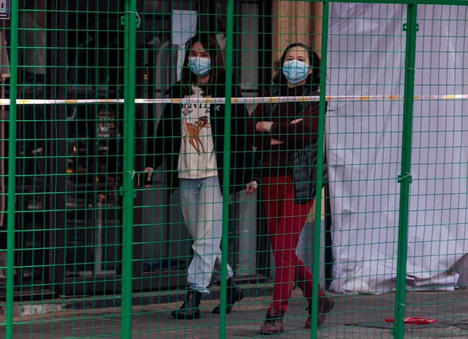 Some citizens in Shanghai woke up to find green fences surrounding their houses