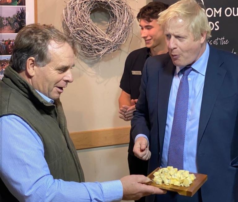 Neil Parish giving cheese to Boris Johnson