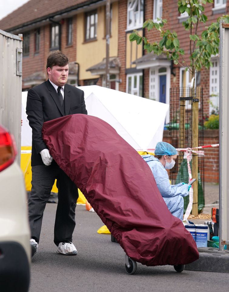 A body is moved from the horrifying scene in Bermondsey, South London