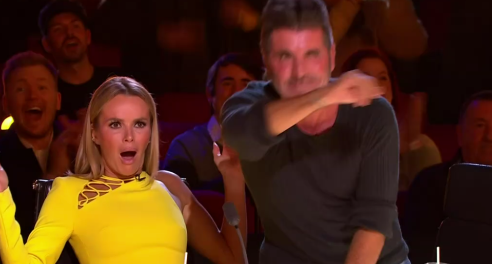 Amanda looked shocked as Simon hit the golden buzzer