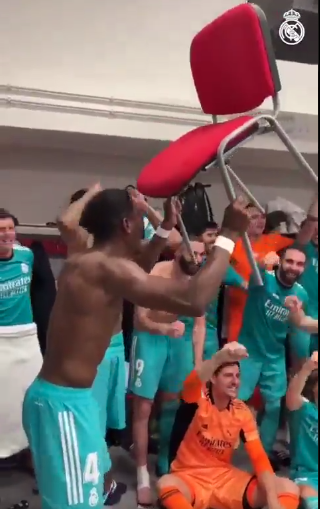 Alaba held up a chair in the same way he did after their win over PSG