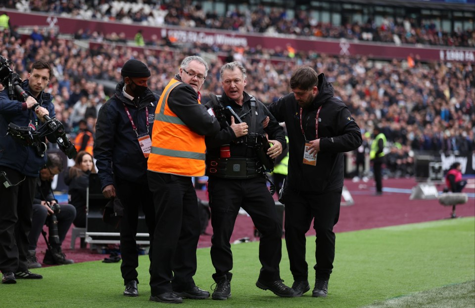 He was helped back to his feet by officials at the stadium