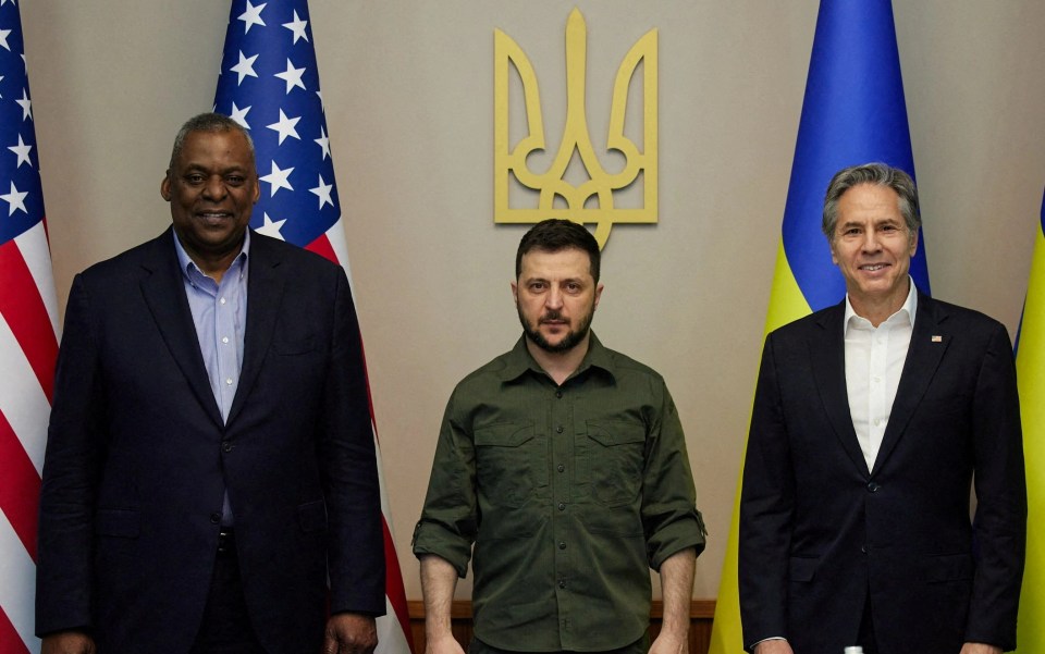 Ukraine’s President Volodymyr Zelenskiy poses for a picture with U.S. Secretary of State Antony Blinken and U.S. Defense Secretary Lloyd Austin before a meeting in Kyiv