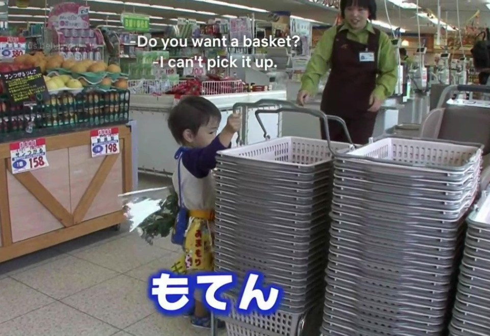 Arriving at the store, the poor little boy initially struggles to pick up a basket before being assisted by a member of staff