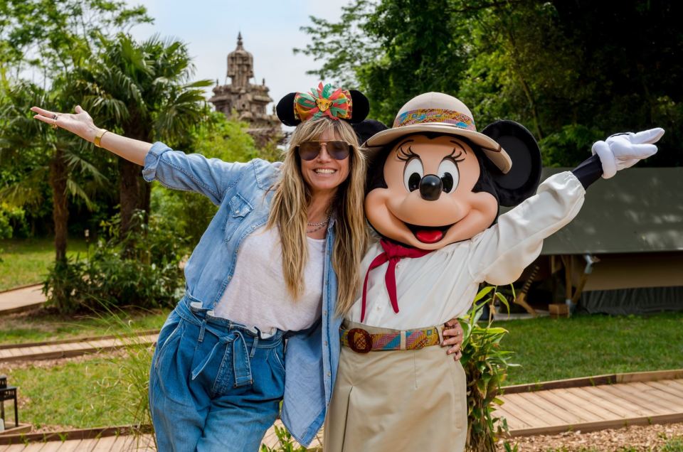 Heidi Klum and Minnie Mouse celebrating the launch of Lion King & Jungle Festival