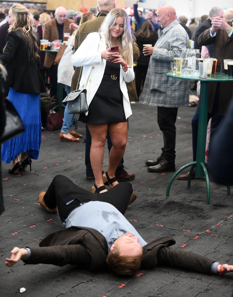 It all got too much for one man, who had a lie down on the carpet after spilling on his shirt