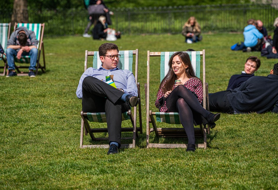 Brits basked in the warm spring sunshine in Green Park, London